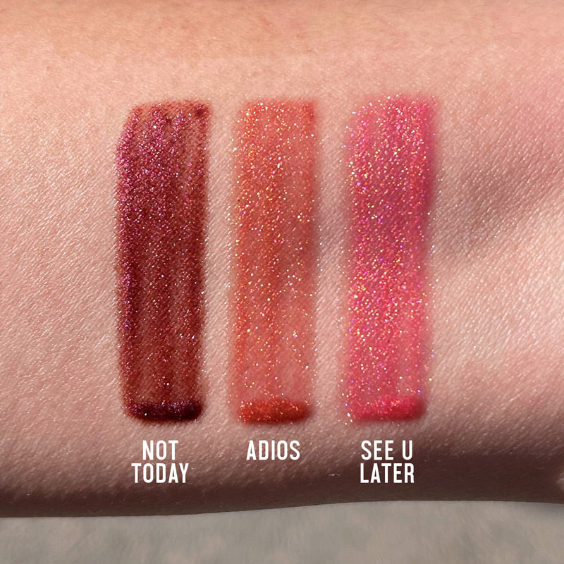 Bye, Cupid Lipgloss arm swatches with names